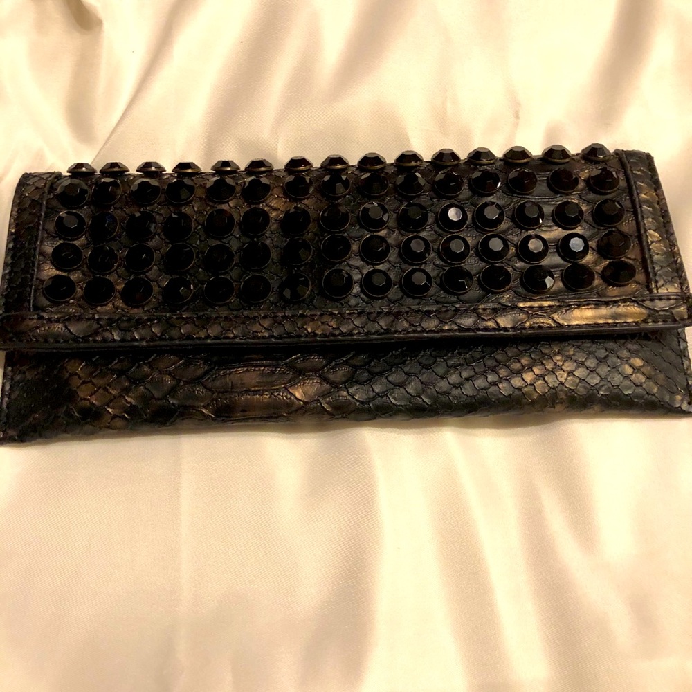 Christian Audigier clutch